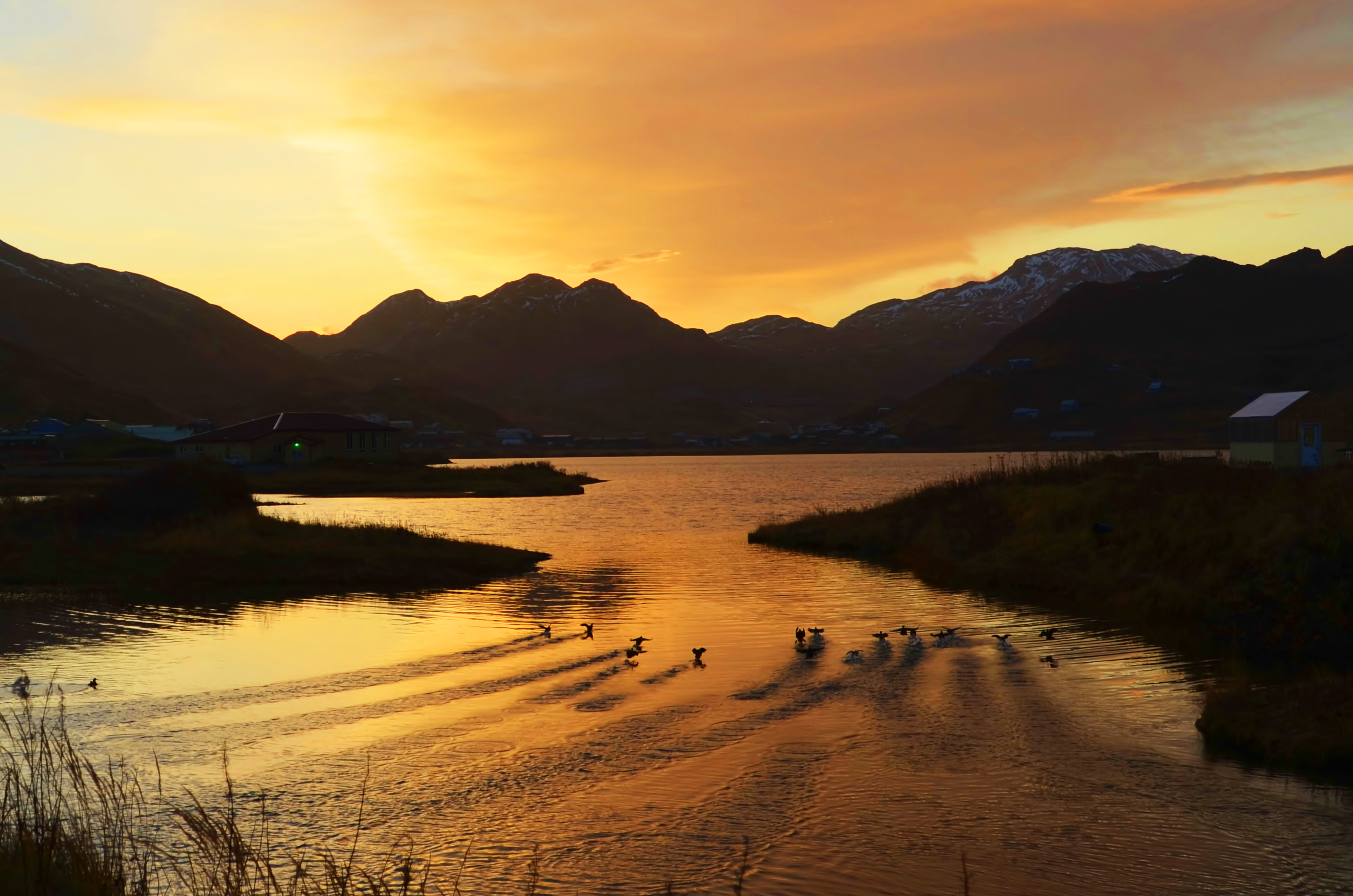 Sunrise over Iliuliuk Creek and Lake (Photo by Albert Burnham)