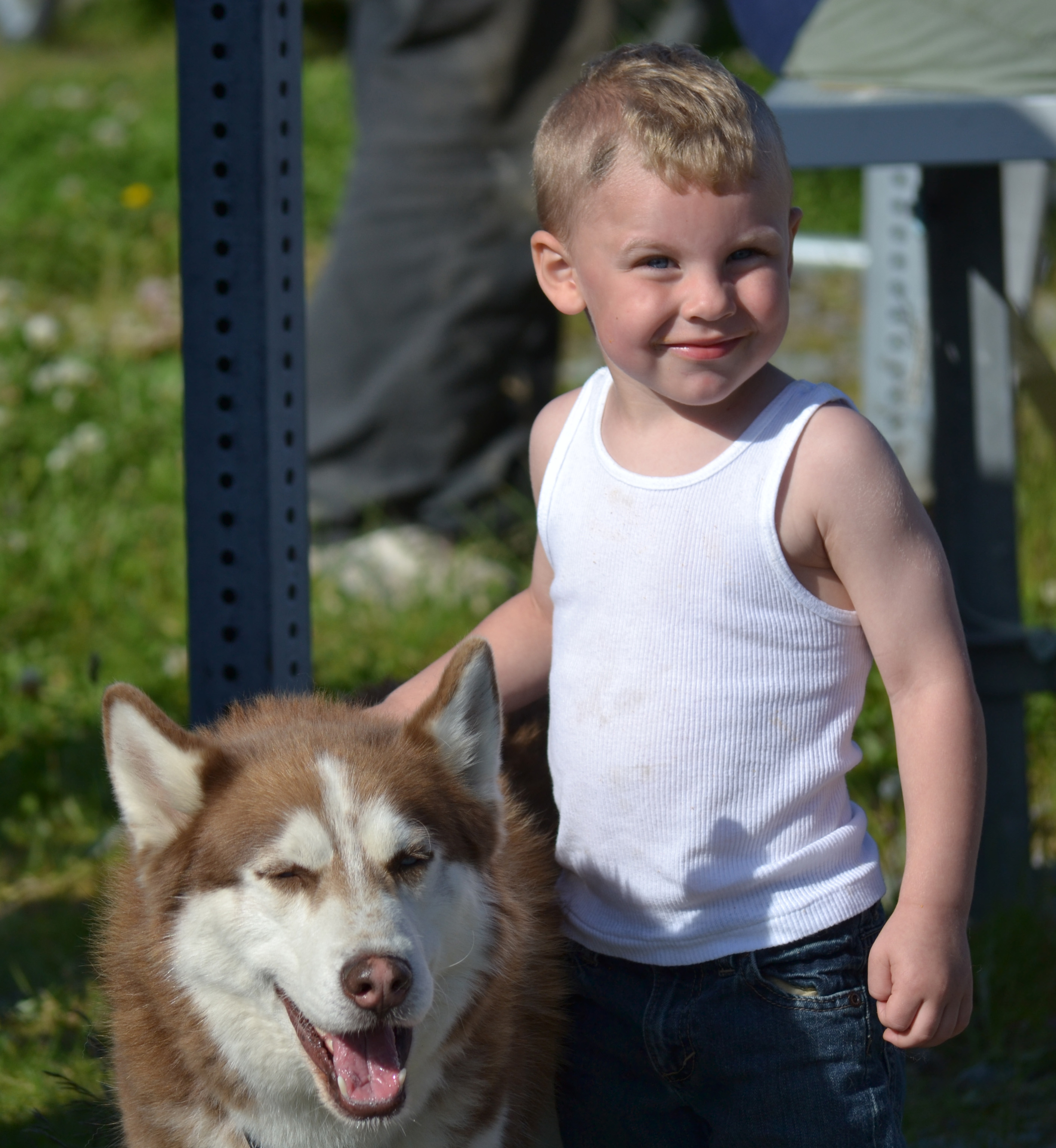 A boy and his dog (Photo by Albert Burnham)