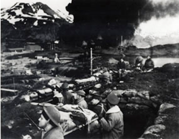 Marines entrenched during Japanese bombing, June 1942