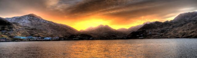 Sunrise over Iliuliuk Lake; photo by Albert Burnham