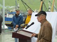 Carl Moses speaking at dedication ceremony of boat harbor bearing his name
