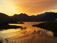 Sunrise over Iliuliuk Creek and Lake (Photo by Albert Burnham)