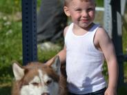 A boy and his dog (Photo by Albert Burnham)