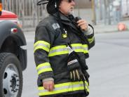 Volunteer Steve Engman coordinates water transfer from Engine 3 to the ARF truck