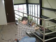 Facilities Maintenance employee working at the Aquatic Center.